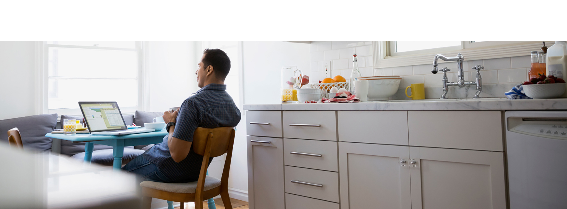 man sitting at table