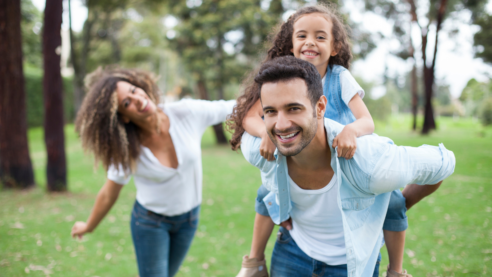 family outside in park