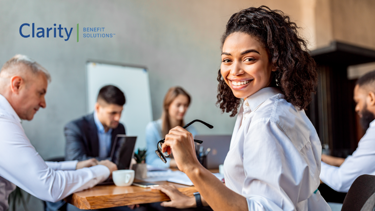 Clarity Benefit Solutions, Happy Corporate Employee in a Meeting