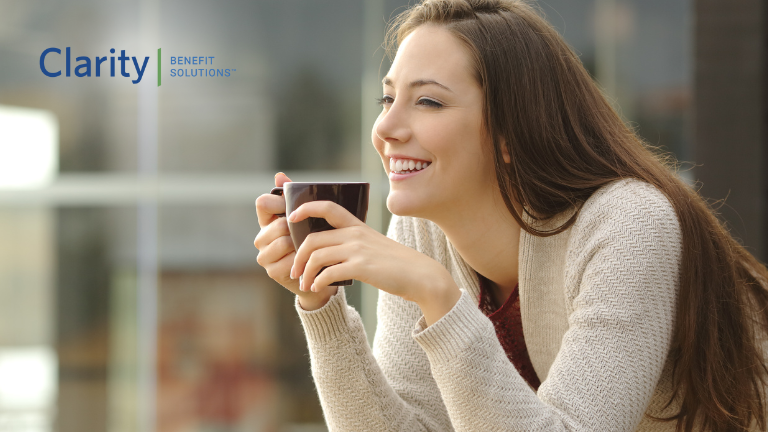 Nurturing Emotional Wellness - Your Guide to a Healthier Mind. A woman drinking a cup of coffee and happy about her emotional wellness