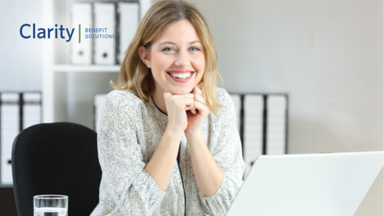 The Benefits of Offering Voluntary Benefits to Employees. A woman drinking a cup of coffee and happy about her emotional wellness